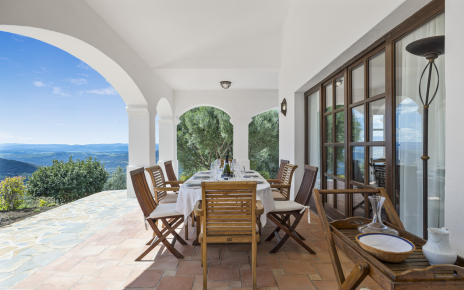 Furnished porch next to main living room. Amazing views.